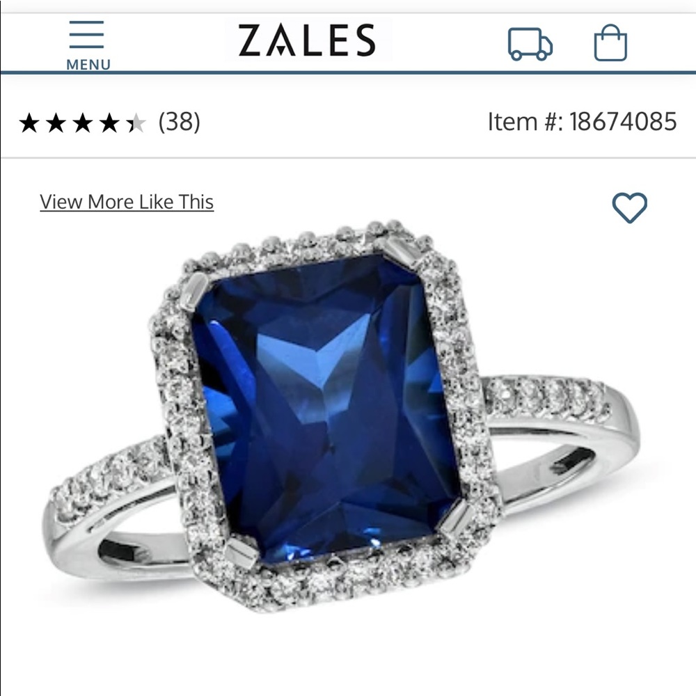 Zales 10kt ring with Saphire stone and small diamonds